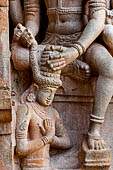 The great Chola temples of Tamil Nadu - The Brihadisvara temple of Gangaikondacholapuram. Detail of the panel of Shiva bestowing a wreath on the patron of the royal temple (North).  